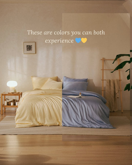 Bedroom with yellow and blue bedding, which are dog and car friendly colors