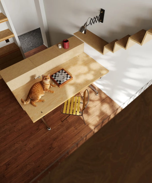 Cat playing with a checkered board on a wooden table in a room with stairs.